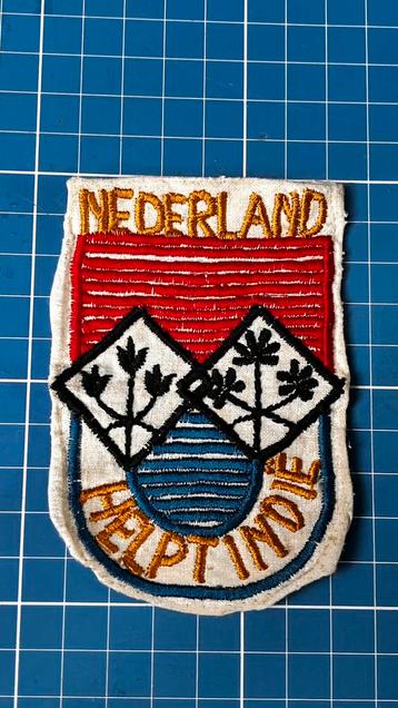 Mouwembleem NEDERLAND HELPT INDIE  schaars beschikbaar voor biedingen