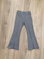 Zwart/wit geblokte flared broek - WE Fashion - maat 134, Kinderen en Baby's, Meisje, Ophalen of Verzenden, Broek, WE Fashion