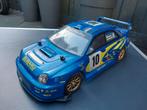 Nikko subaru impreza wrc, Hobby en Vrije tijd, Modelbouw | Radiografisch | Auto's, Ophalen of Verzenden, Auto onroad