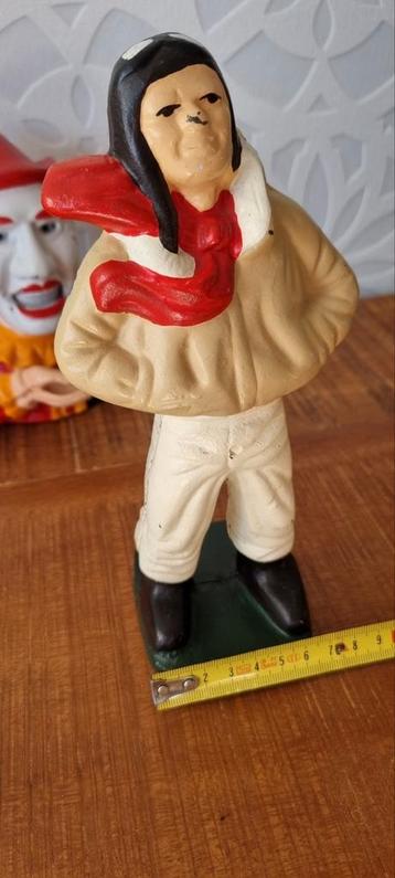 2 Gietijzeren Spaarpotten Clown Piloot barnstormer spaartpot beschikbaar voor biedingen