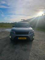 Suzuki Vitara 1.4 Boosterjet 140pk Allgrip Aut 2016 Grijs, Auto's, Automaat, Leder, Vierwielaandrijving, Particulier