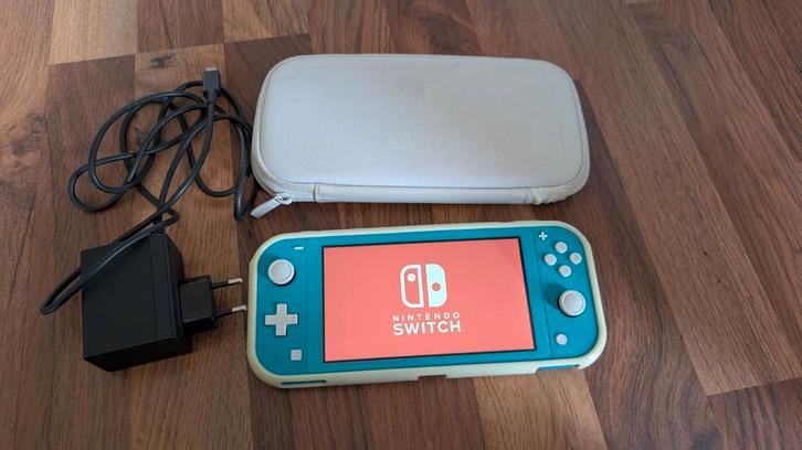 Nintendo Switch lite + toebehoren, Spelcomputers en Games, Spelcomputers | Nintendo Switch Lite, Zo goed als nieuw, Ophalen of Verzenden