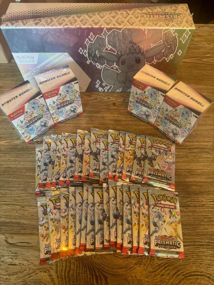 Pokemon Prismatic Evolutions SPC, ETB & meer, Hobby en Vrije tijd, Verzamelkaartspellen | Pokémon, Nieuw, Booster, Foil, Ophalen of Verzenden