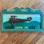 Wandpaneel met 3D-vliegtuig (metaal) op houten achtergrond, Ophalen