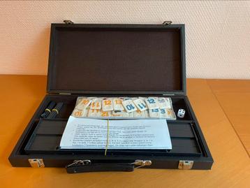 Luxe Rummikub in koffer. Het spel is nog nieuw beschikbaar voor biedingen