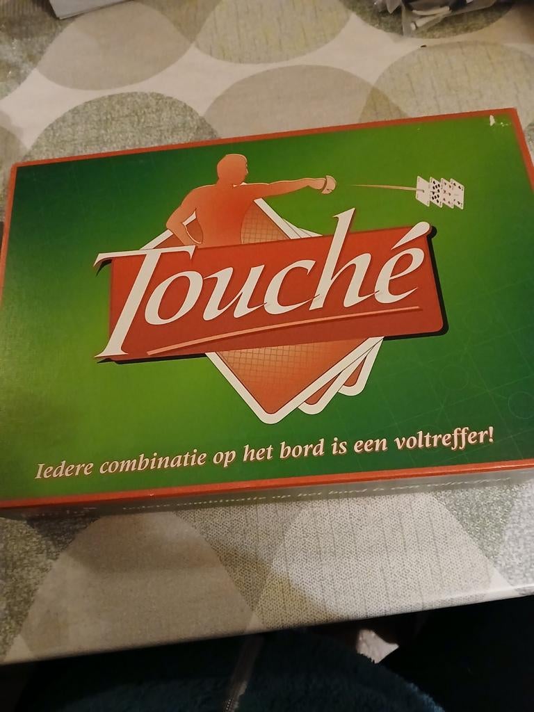 Touche! Bordspel - Uitdagend en leuk!, Hobby en Vrije tijd, Gezelschapsspellen | Bordspellen, Vijf spelers of meer, Ophalen, Zo goed als nieuw