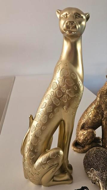 Groot beeld luipaard goud  beschikbaar voor biedingen