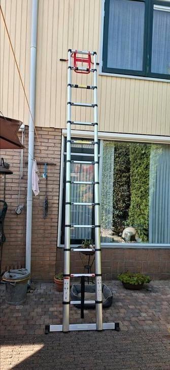 Telescoopladder Aldorr en afstandhouder, Doe-het-zelf en Verbouw, Ladders en Trappen, Zo goed als nieuw, 4 meter of meer, Ophalen