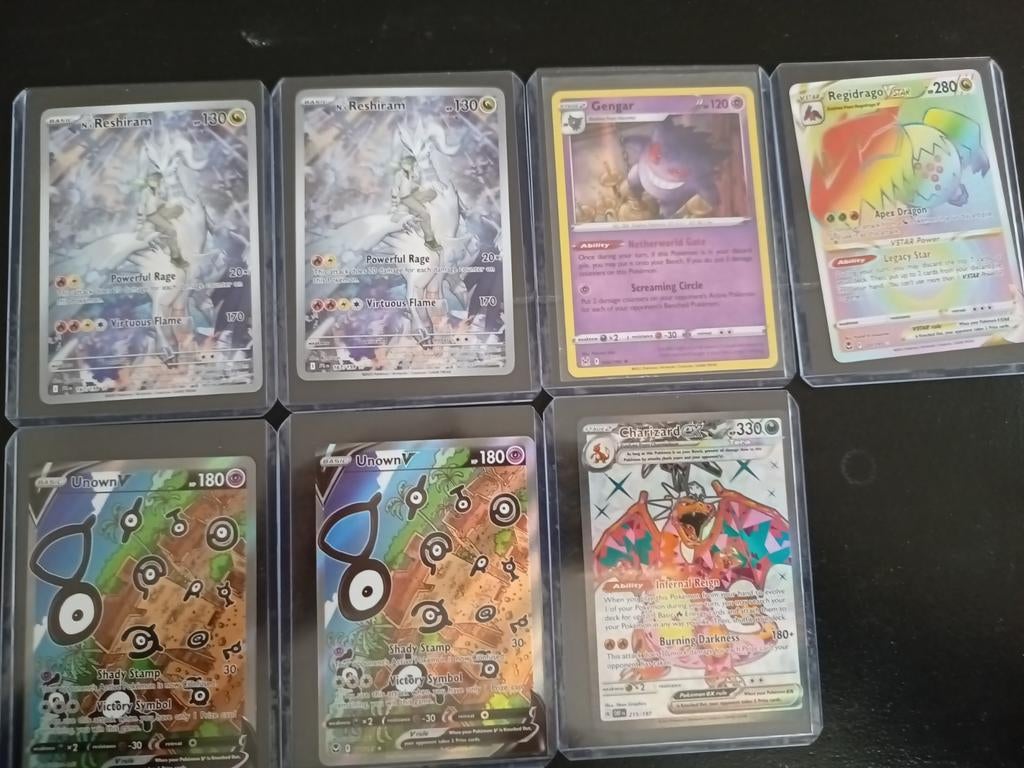 Pokémon Kaarten - Reshiram, Unown V, Charizard EX, Ophalen of Verzenden, Zo goed als nieuw, Losse kaart, Foil
