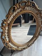 Ovale gouden spiegel met sierlijke rand, Antiek en Kunst, Antiek | Spiegels, Ophalen of Verzenden, Ovaal, Minder dan 50 cm, Minder dan 100 cm