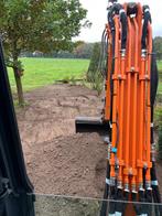 Minigraver met machinist, Ophalen, Nieuw, Straatzand