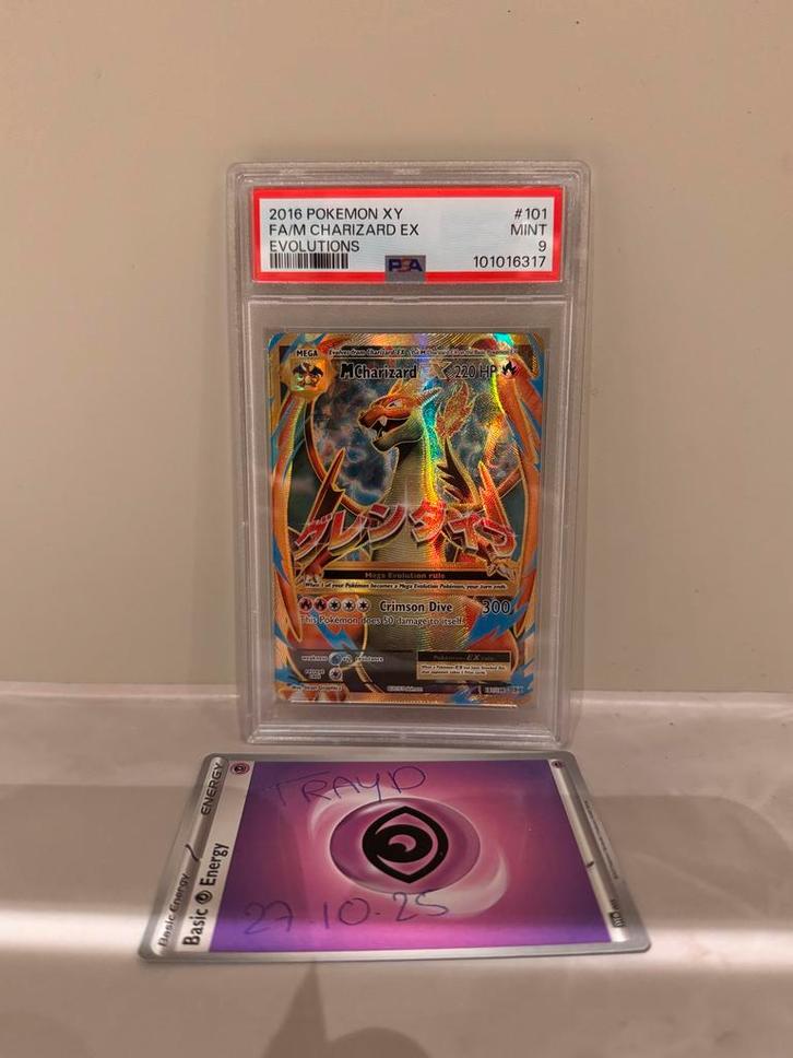 PSA 9 M Charizard EX - Evolutions, Hobby en Vrije tijd, Verzamelkaartspellen | Pokémon, Zo goed als nieuw, Ophalen of Verzenden