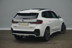 BMW iX1 eDrive20 M Sport | Trekhaak / Panoramadak / Harman K, Stof, Met garantie (alle), Wit, 204 pk