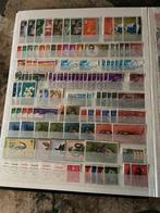 Postzegelalbum Indonesië/suriname/indie/enz(12 bladzijden), Postzegels en Munten, Postzegels | Volle albums en Verzamelingen, Ophalen of Verzenden