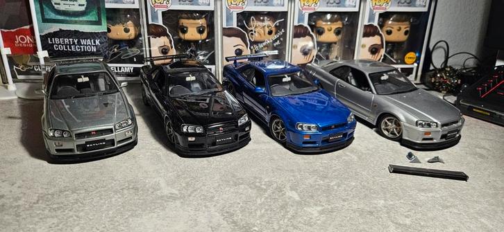 SUPER SALE 4x 1:18 Nissan skyline GT-R R34 V-spec Autoart, Hobby en Vrije tijd, Modelauto's | 1:18, Zo goed als nieuw, Auto, Autoart