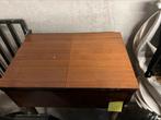 Tafel met uitklapbare naaimachine, Ophalen