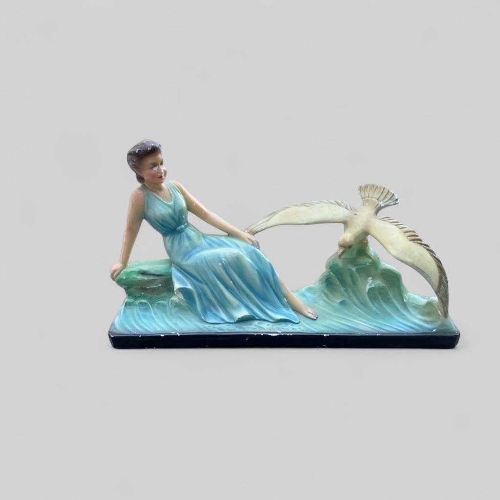 Art deco beeld vrouw met vogel, Ophalen