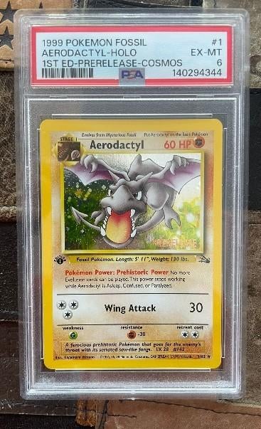 Aerodactyl #1 Holo 1st edition prerelease Cosmos PSA 6, Hobby en Vrije tijd, Verzamelkaartspellen | Pokémon, Verzenden, Gebruikt