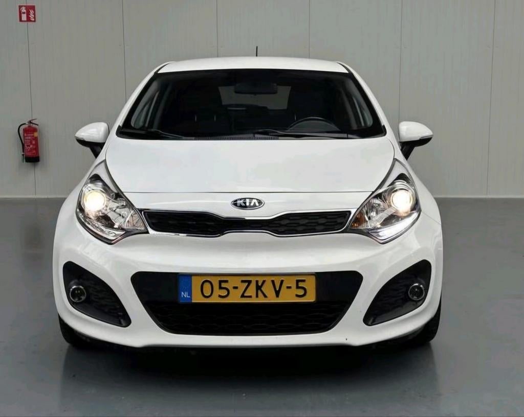 Kia Rio 1.2 I 5DRS B.J. Dec. 2012 Wit, Auto's, Kia, Particulier, Rio, Airbags, Airconditioning, Bluetooth, Centrale vergrendeling