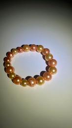 Armbandje oranje goud, Sieraden, Tassen en Uiterlijk, Armbanden, Ophalen of Verzenden, Zo goed als nieuw, Kunststof of Plastic