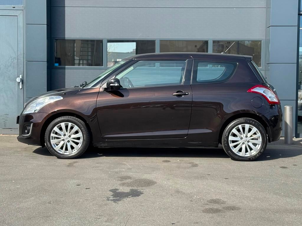 Suzuki Swift 1.2 Comfort EASSS Airco|Cruise|1e Eigenaar, Auto's, Voorwielaandrijving, Stof, Gebruikt, Bruin