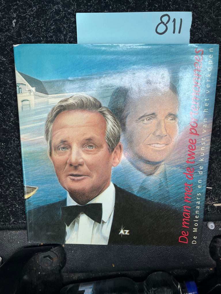 De man met de twee portemonnees - Molenaars en kunst, Ophalen of Verzenden, Zo goed als nieuw