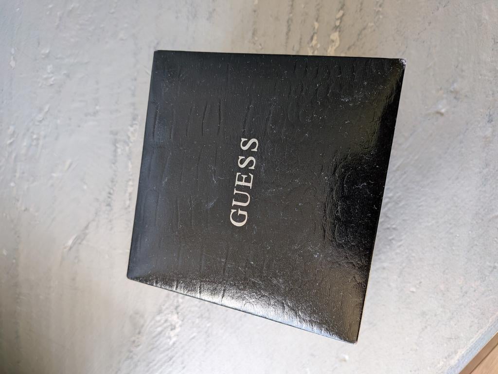 Guess horloge met zwarte band en zilveren kast, Ophalen of Verzenden