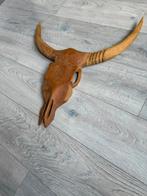 Houten koeien skull, Ophalen