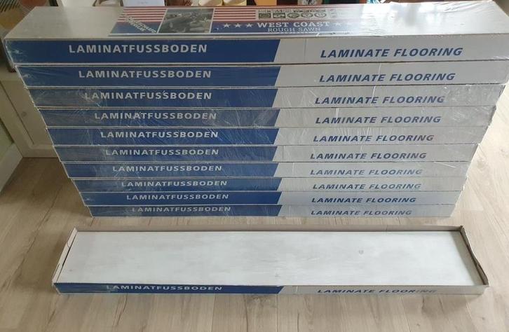 26 m2 nieuwe laminaat West Coast 296400, Wit gekalkt, Huis en Inrichting, Stoffering | Vloerbedekking, Nieuw, Laminaat, Wit, Grijs