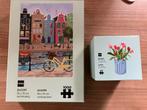 Hema puzzels: amsterdamse gracht en tulpen, Hobby en Vrije tijd, Ophalen of Verzenden, 500 t/m 1500 stukjes, Zo goed als nieuw