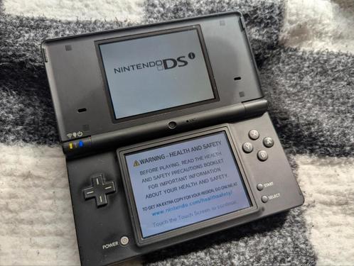 Nintendo DSi inc lader en spellen., Spelcomputers en Games, Spelcomputers | Nintendo DS, Zo goed als nieuw, Ophalen of Verzenden