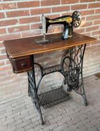 Antieke Singer Trapnaaimachine, Ophalen