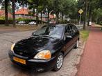 Kia Rio 1.5 I 16V HB 2003 Zwart, Auto's, Kia, Voorwielaandrijving, 4 cilinders, Bluetooth, Zwart