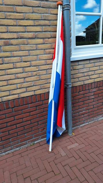Nederlandse vlag met stok.