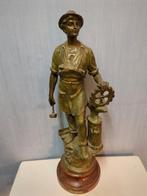 Bronzen beeld van een smid, Ophalen