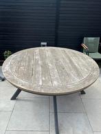 Ronde teakhouten buitentafel, Ophalen