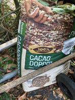 Cacaodoppen nieuw, Cacaodoppen, Ophalen