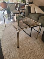 Salontafel gerookt glas met goudkleurig frame., Huis en Inrichting, Tafels | Salontafels, Gebruikt, 100 tot 150 cm, 50 tot 100 cm