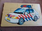 Houten puzzel politieauto 24 stukjes, Ophalen of Verzenden, 10 tot 50 stukjes, Gebruikt, 2 tot 4 jaar