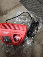 Nieuwe Originele Milwaukee M12 Acculader, Ophalen of Verzenden, Nieuw