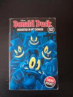 Donald Duck thema pocket 52 - Duckstad in het donker, Ophalen of Verzenden, Gelezen