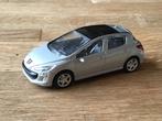 Peugeot 208 van Rastar 1:43, Hobby en Vrije tijd, Modelauto's | 1:43, Ophalen of Verzenden, Gebruikt, Auto, Overige merken