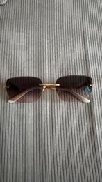 Cartier Zonnebril met amber geslepen glazen, Ophalen of Verzenden, Zo goed als nieuw, Bruin, Overige merken