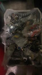 Krat vol uitlaatklemmen,div merken bromfietsen, Ophalen, Nieuw