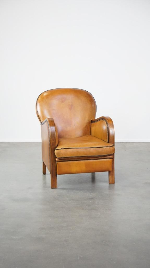 Luxe schapenleren fauteuil gecombineerd met hout, Huis en Inrichting, Fauteuils, Gebruikt, Hout, Leer, 50 tot 75 cm, 75 tot 100 cm