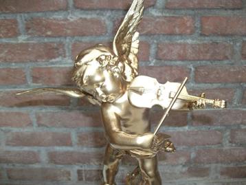 Een gouden viool bespeeld door een Engel beschikbaar voor biedingen