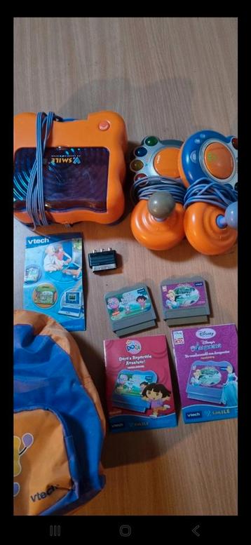 VTech Smile spelcomputer + spellen beschikbaar voor biedingen