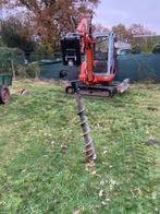 Minigraver met machinist, Ophalen, Tuinaarde