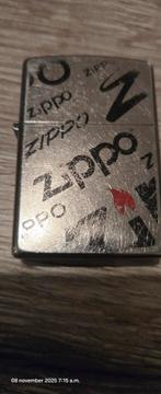 Zippo Aansteker met Zippo Logo's, Verzamelen, Rookartikelen, Aanstekers en Luciferdoosjes, Ophalen of Verzenden, Gebruikt, Aansteker
