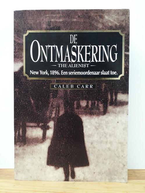 Caleb Carr - De ontmaskering, Boeken, Thrillers, Zo goed als nieuw, Ophalen of Verzenden